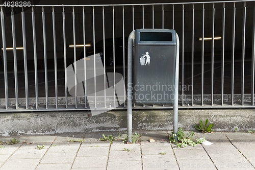 Image of Dustbin urban street at a bus stop