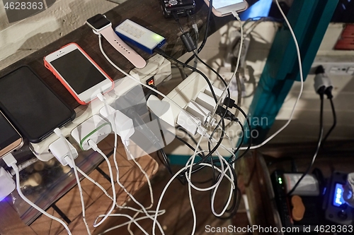 Image of Charging phones and other devices in a mess