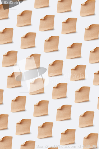 Image of Old parchment paper sheets pattern on a white background.