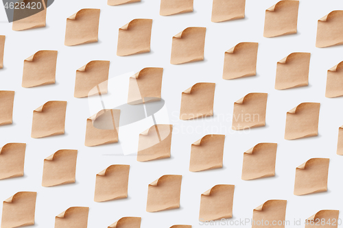 Image of Vintage parchment paper sheets pattern on a white background.