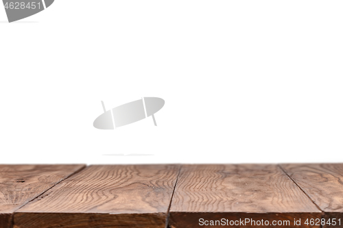 Image of Blank wooden table backdrop on a white background.