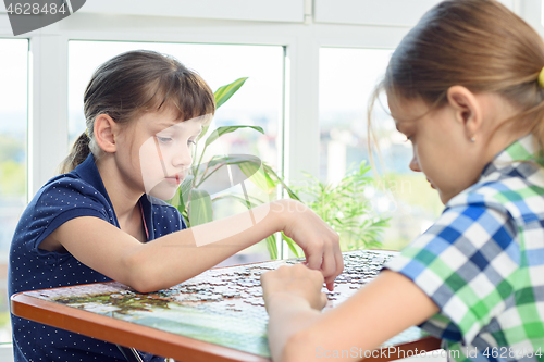 Image of Children at home spend their free time at the weekend