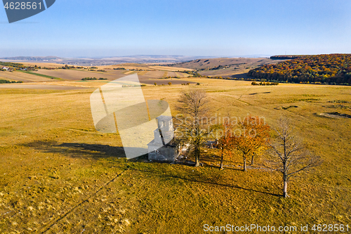 Image of Abandoned tower on autumn hill