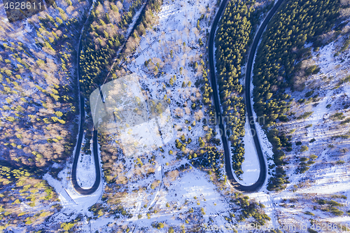 Image of Winding  road in winter forest