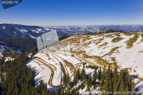 Image of Aerial view of a curvy road in Romanian Carpathians