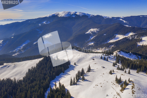 Image of Mountain winter scene, aerial sunny day view