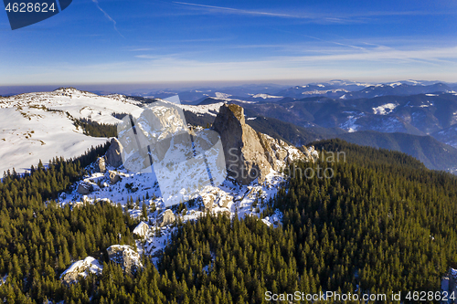 Image of Aerial winter panorama in romanian mountains