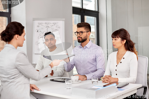 Image of recruiters having job interview with employee