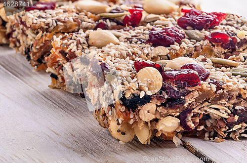 Image of Closeup cereal granola bar with nuts
