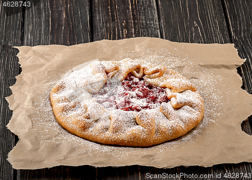 Image of Galetta open gooseberries pie on paper