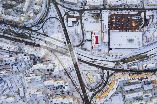 Image of City road junctions on the bridge, above winter scene