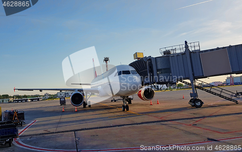 Image of Airplane in airport terminal for boarding