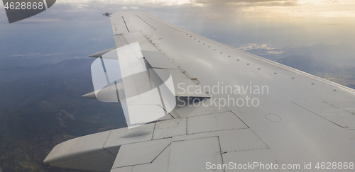 Image of Plane wing before sunset