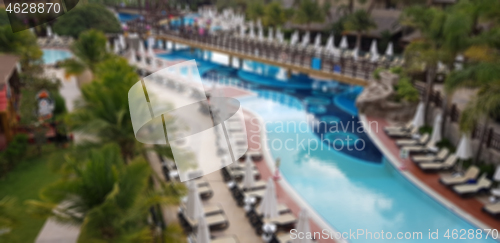 Image of Abstract blur of tropical pool, exotic vacation concept