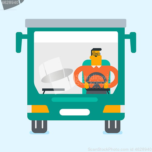 Image of Caucasian bus driver sitting at steering wheel.