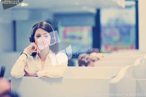 Image of female call centre operator doing her job