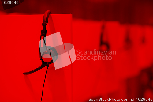 Image of Headphones in empty call center office