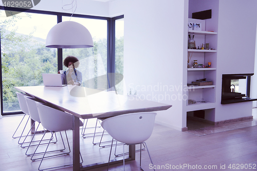 Image of African American woman in the living room