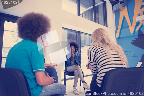 Image of Multiethnic startup business team on meeting