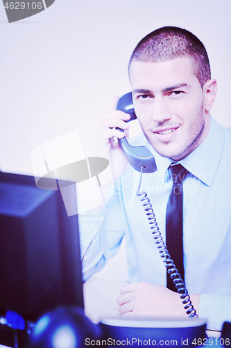 Image of businessman with a headset