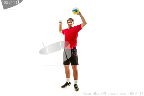 Image of The one caucasian young man as handball player at studio on white background