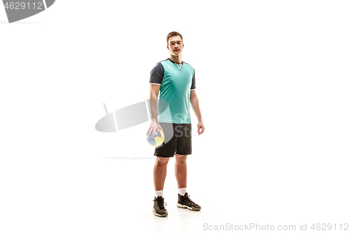 Image of The one caucasian young man as handball player at studio on white background