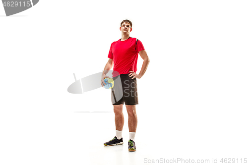 Image of The one caucasian young man as handball player at studio on white background