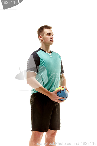 Image of The one caucasian young man as handball player at studio on white background