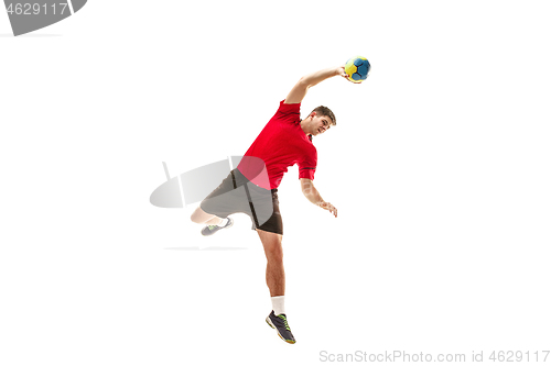 Image of The one caucasian young man as handball player at studio on white background