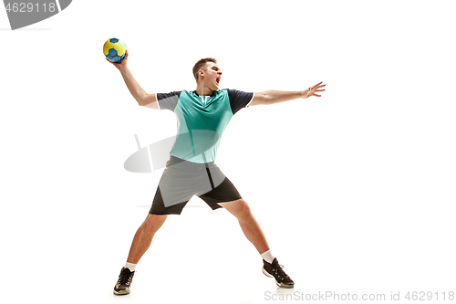 Image of The one caucasian young man as handball player at studio on white background