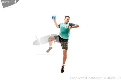 Image of The one caucasian young man as handball player at studio on white background