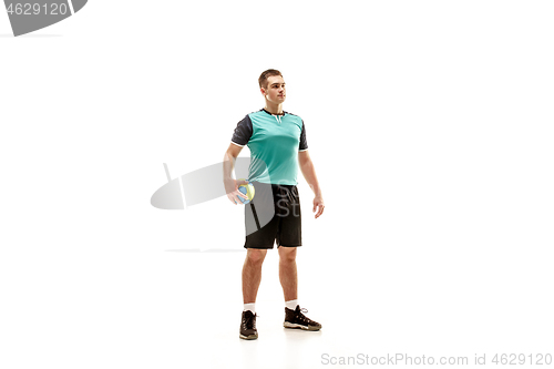 Image of The one caucasian young man as handball player at studio on white background