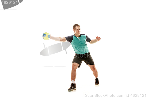 Image of The one caucasian young man as handball player at studio on white background