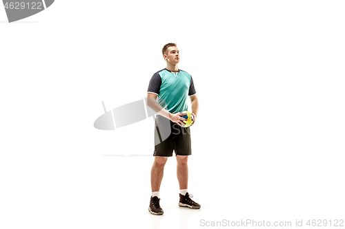 Image of The one caucasian young man as handball player at studio on white background