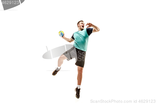 Image of The one caucasian young man as handball player at studio on white background