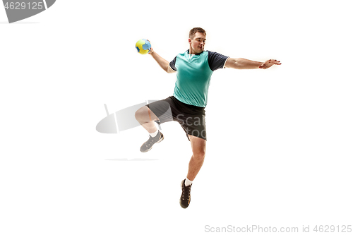 Image of The one caucasian young man as handball player at studio on white background