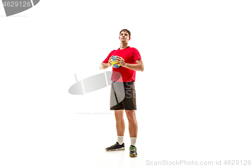 Image of The one caucasian young man as handball player at studio on white background