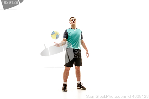 Image of The one caucasian young man as handball player at studio on white background