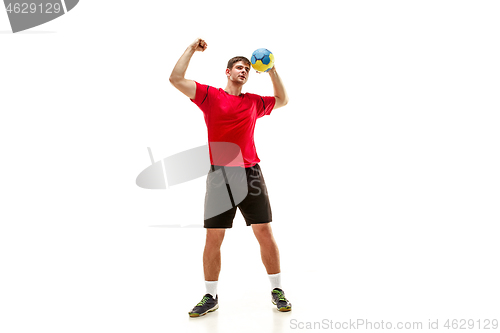 Image of The one caucasian young man as handball player at studio on white background