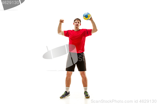 Image of The one caucasian young man as handball player at studio on white background