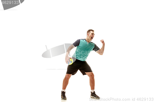 Image of The one caucasian young man as handball player at studio on white background