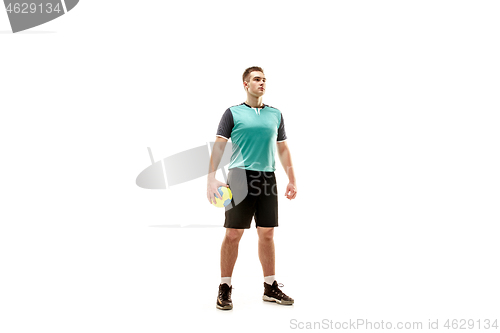 Image of The one caucasian young man as handball player at studio on white background