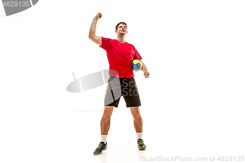 Image of The one caucasian young man as handball player at studio on white background