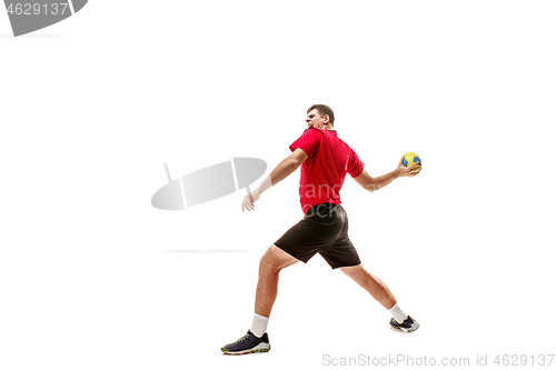 Image of The one caucasian young man as handball player at studio on white background