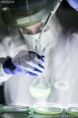 Image of Scientist working in corona virus vaccine development laboratory research facility.