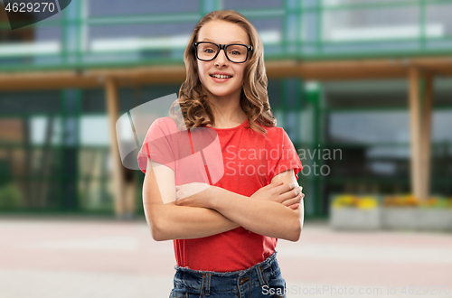 Image of smiling student girl in glasses and red t-shirt