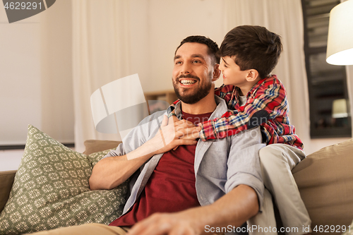 Image of portrait of happy father and little son at home