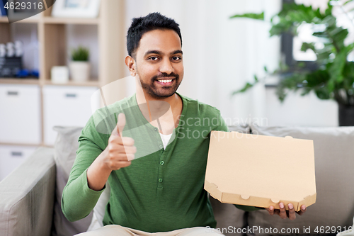 Image of indian man with takeaway pizza showing thumbs up