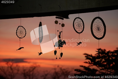 Image of Decoration hanging on a terrace at dusk