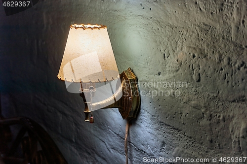 Image of Lamp in a dim room